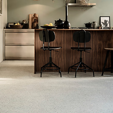 A kitchen with a fitted floor