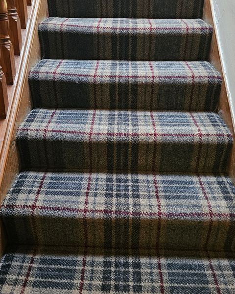 Tartan carpet on a straight staircase